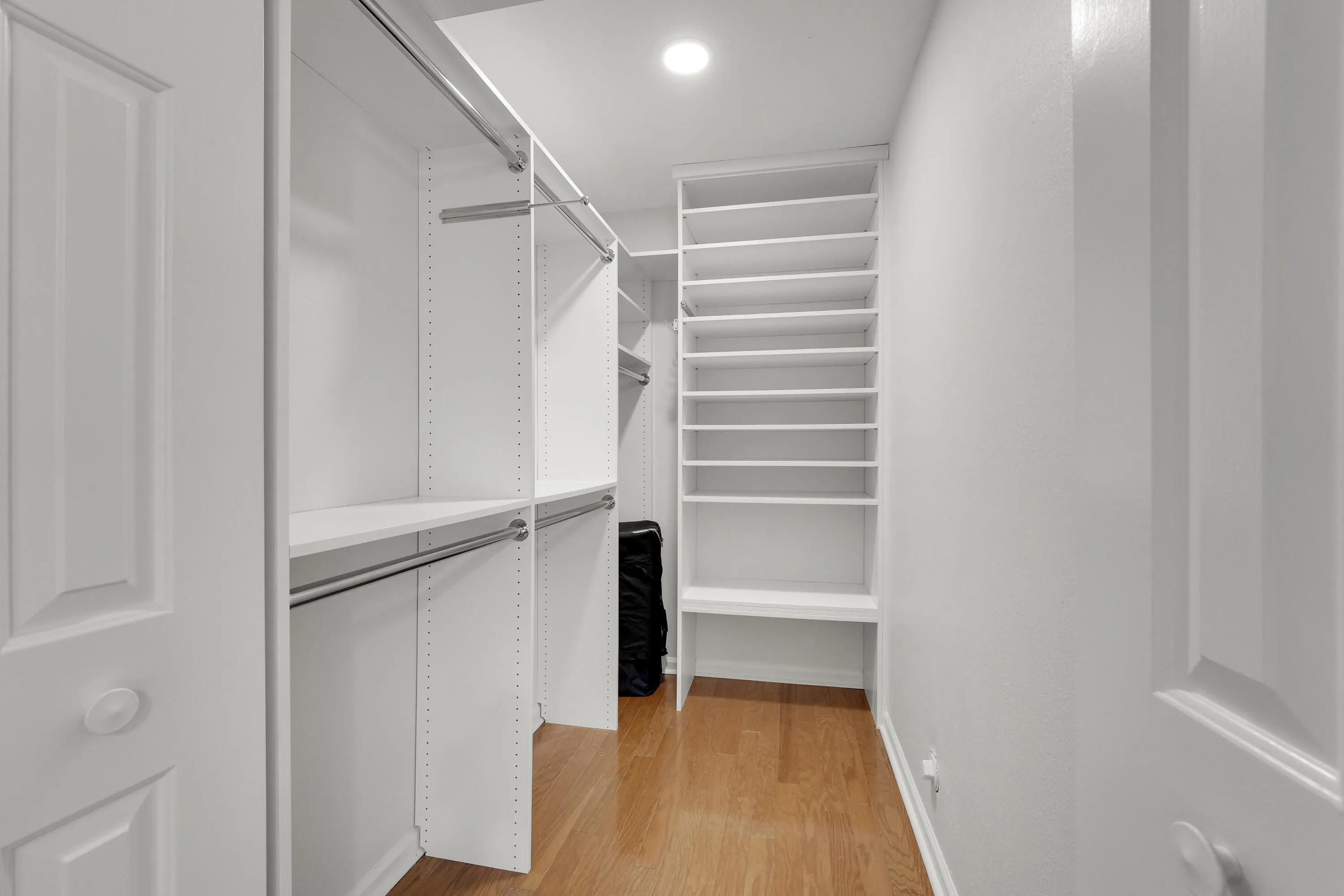 Walk-in closet with built-in organizers