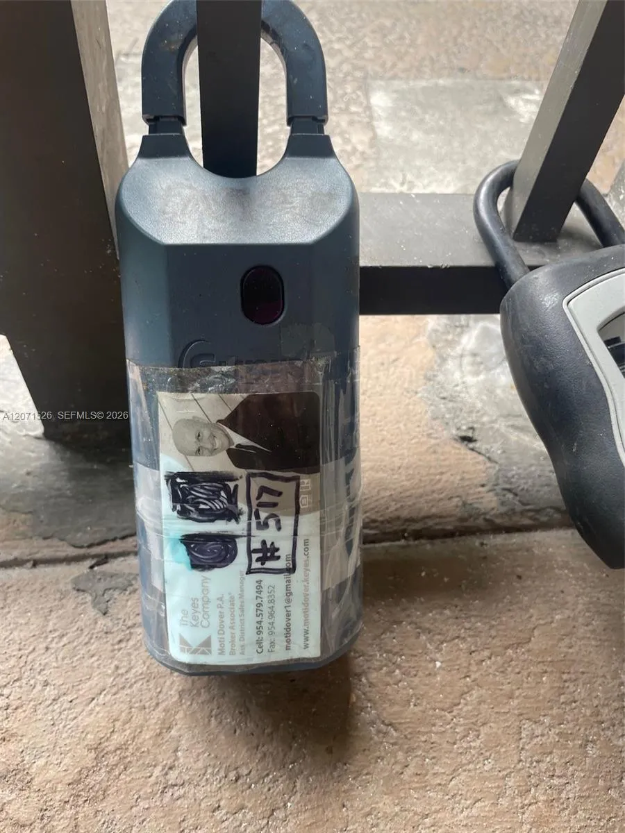 Supra Lockbox next to the Building Front Door and Mailbox