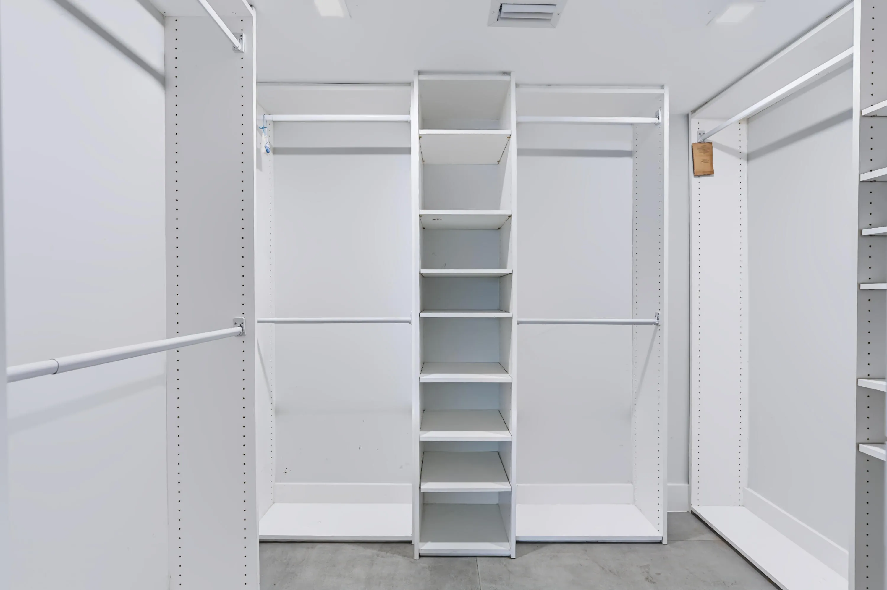 Customizable closet system with multiple shelving units and hanging rods