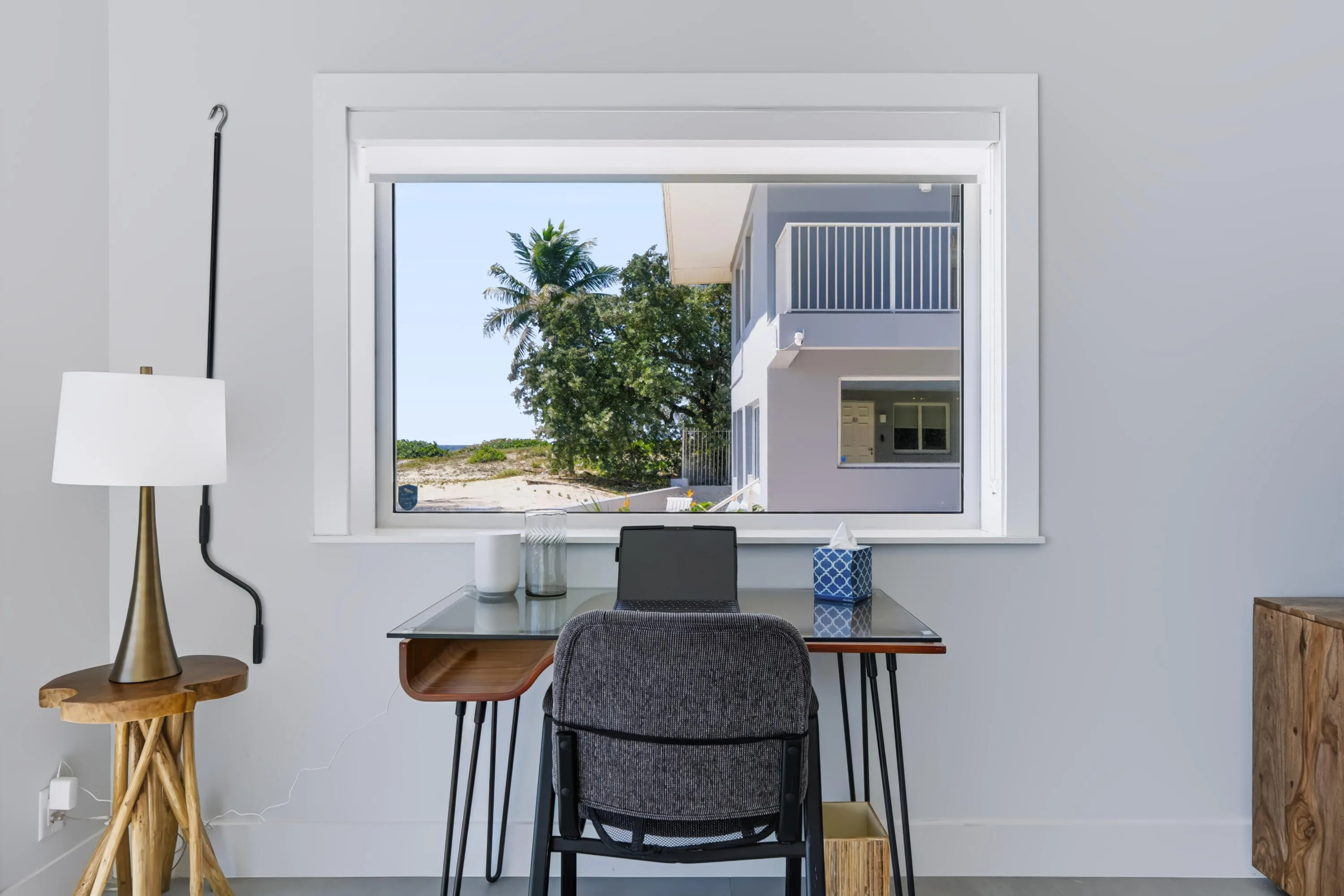 White framed window with a roller shade
