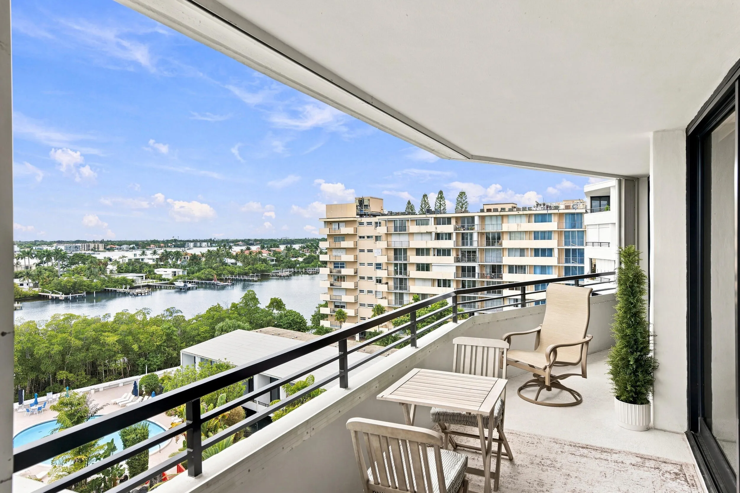 Expansive private balcony with water and city panoramas