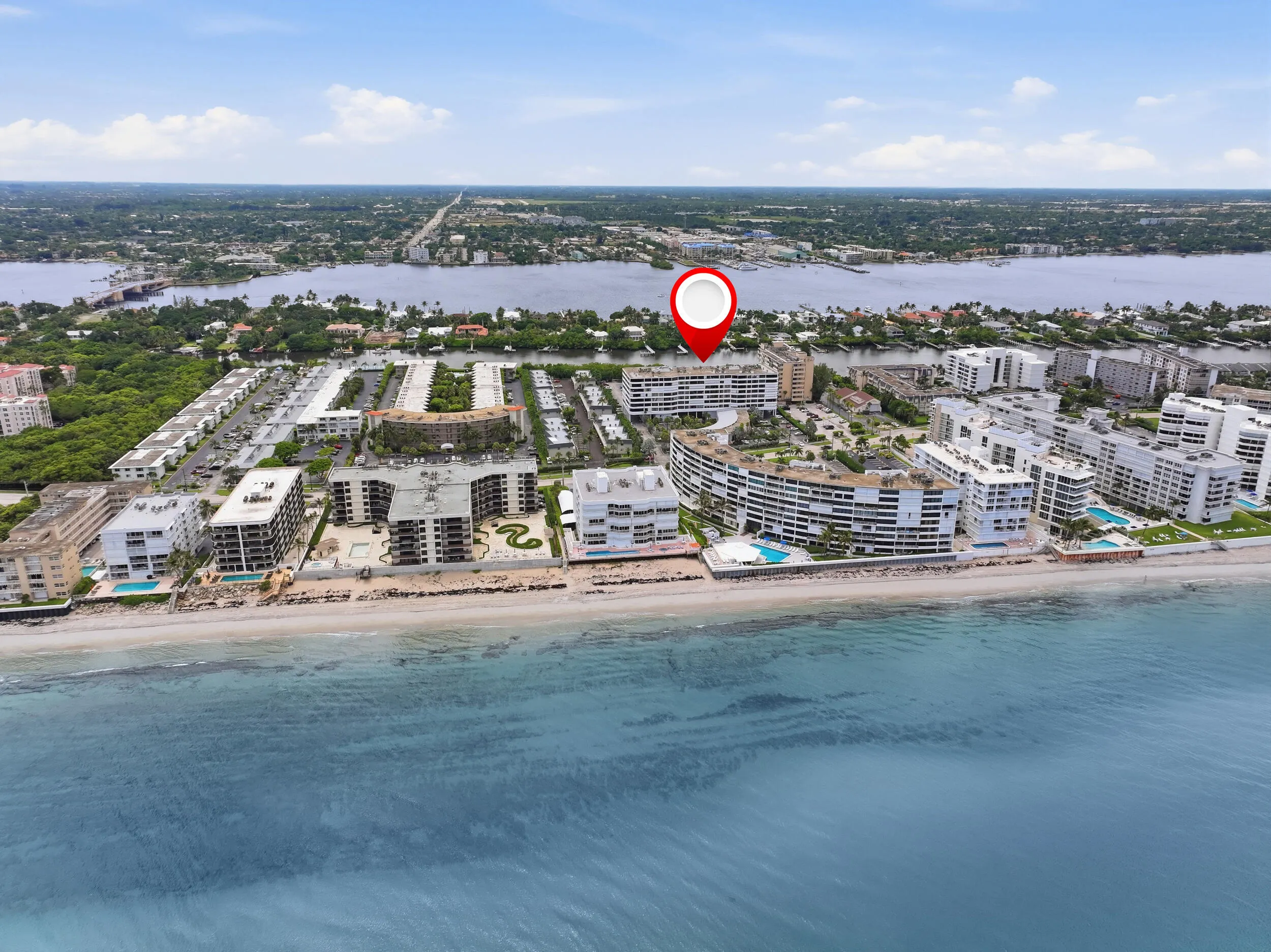 Coastal community featuring white sand beaches and beachfront properties