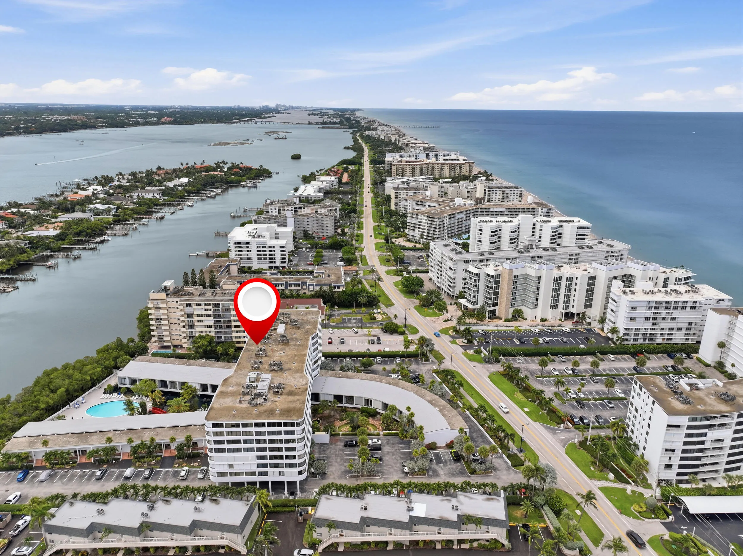 Aerial perspective highlighting a waterfront community with direct ocean access