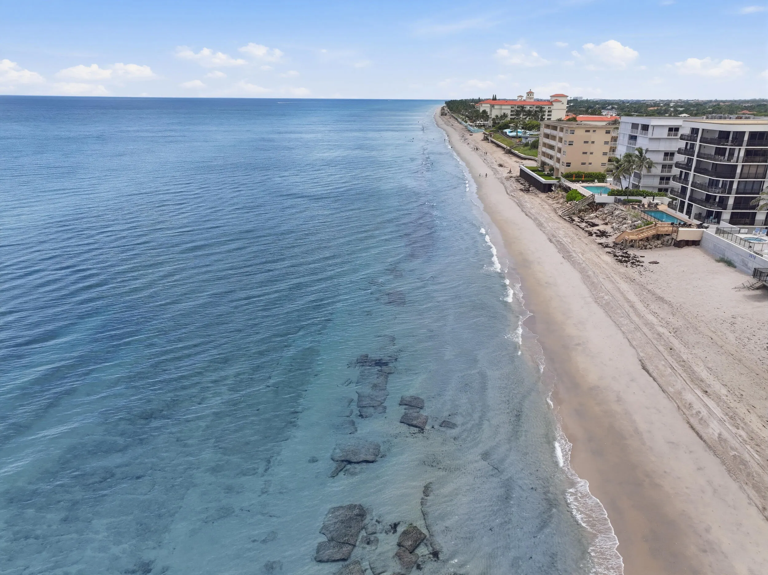 Expansive beachfront property featuring direct access to the sand