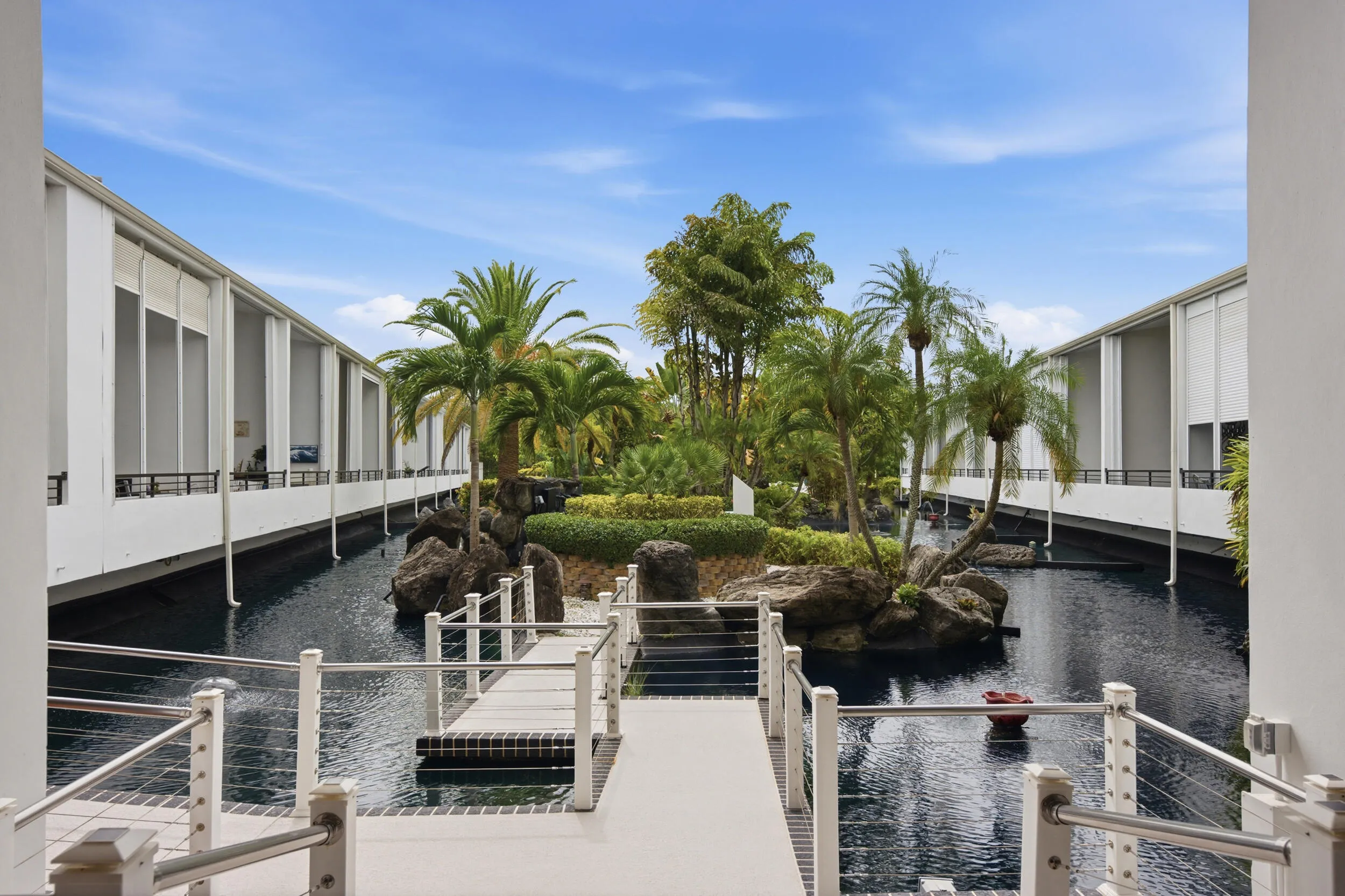 Expansive water feature with a central landscaped island