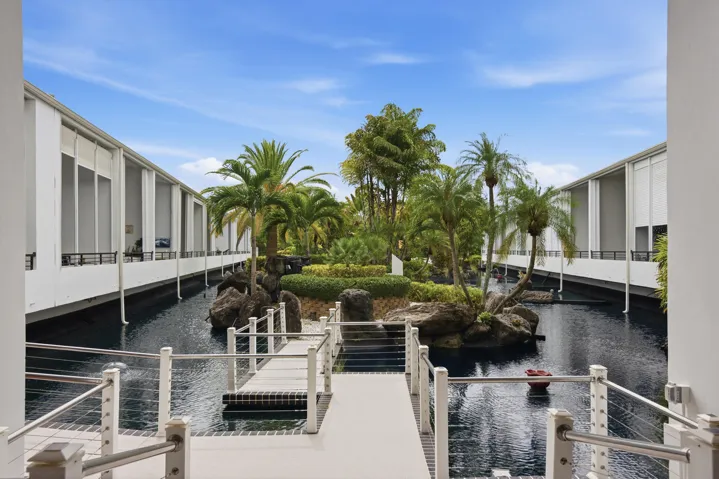 Expansive water feature with a central landscaped island