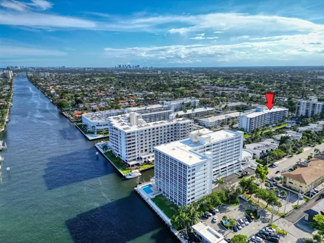 Waterfront high-rise building with a private pool deck