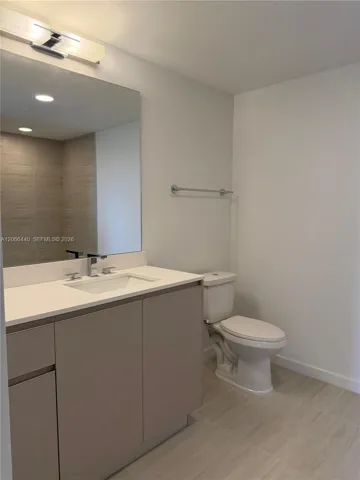 Spacious master bathroom with dual sinks and a neutral palette, perfect for adding your own style and decorations.