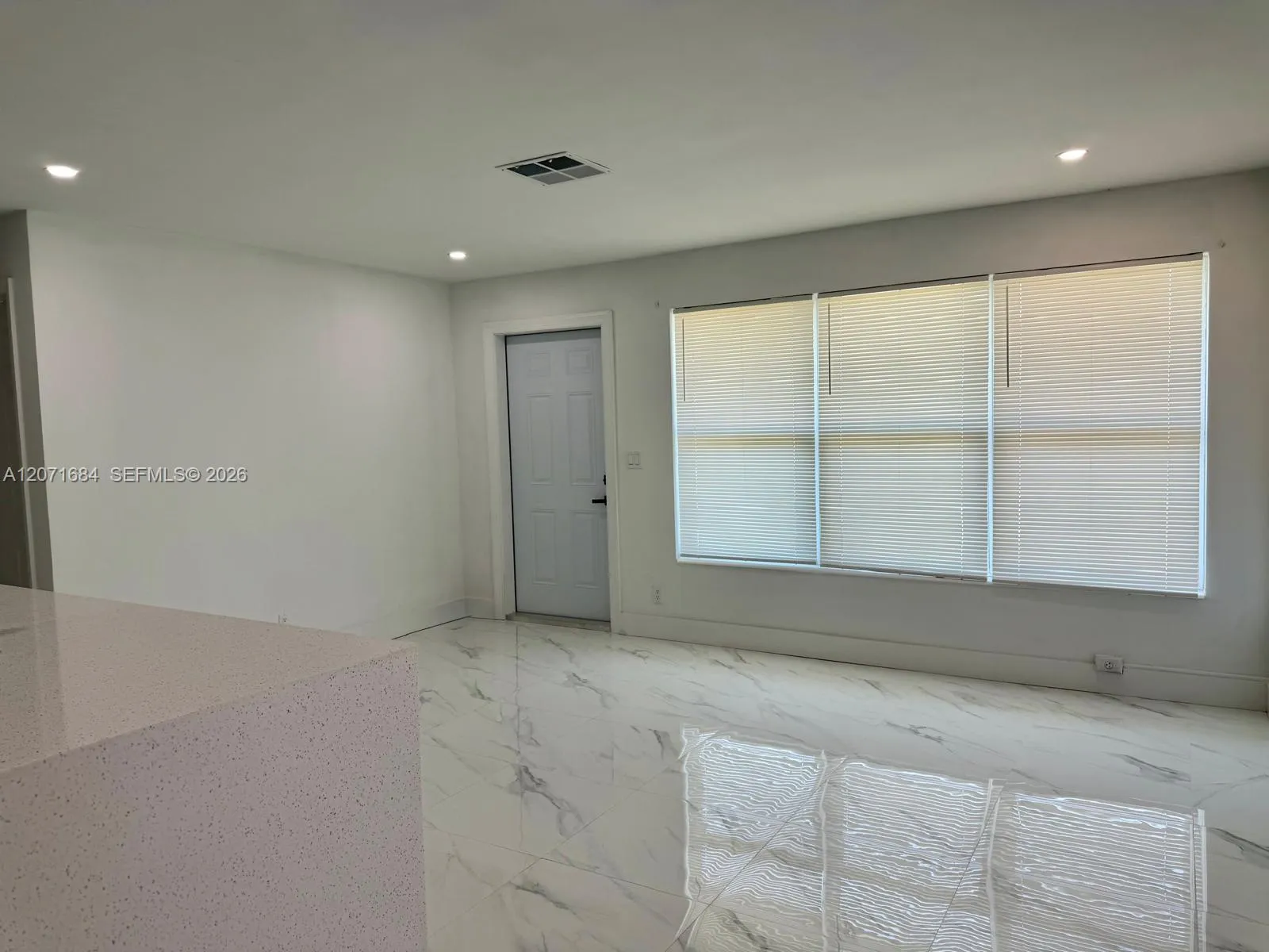 Spacious living area with abundant natural light