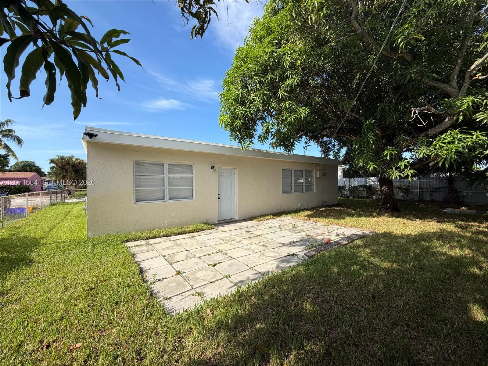 Rear exterior and backyard area