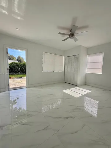 Spacious additional rear room with separate exterior entrance
