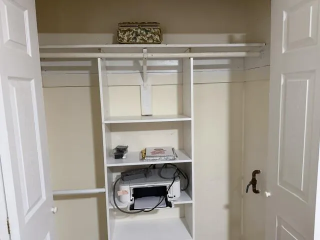 Guest bedroom custom racked closet