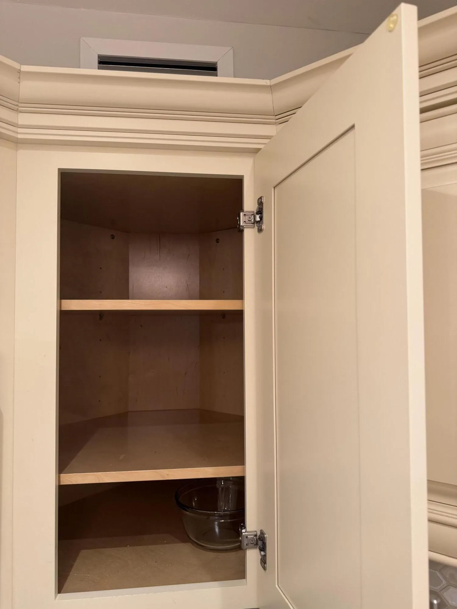 Custom cabinetry with depth and shelving.