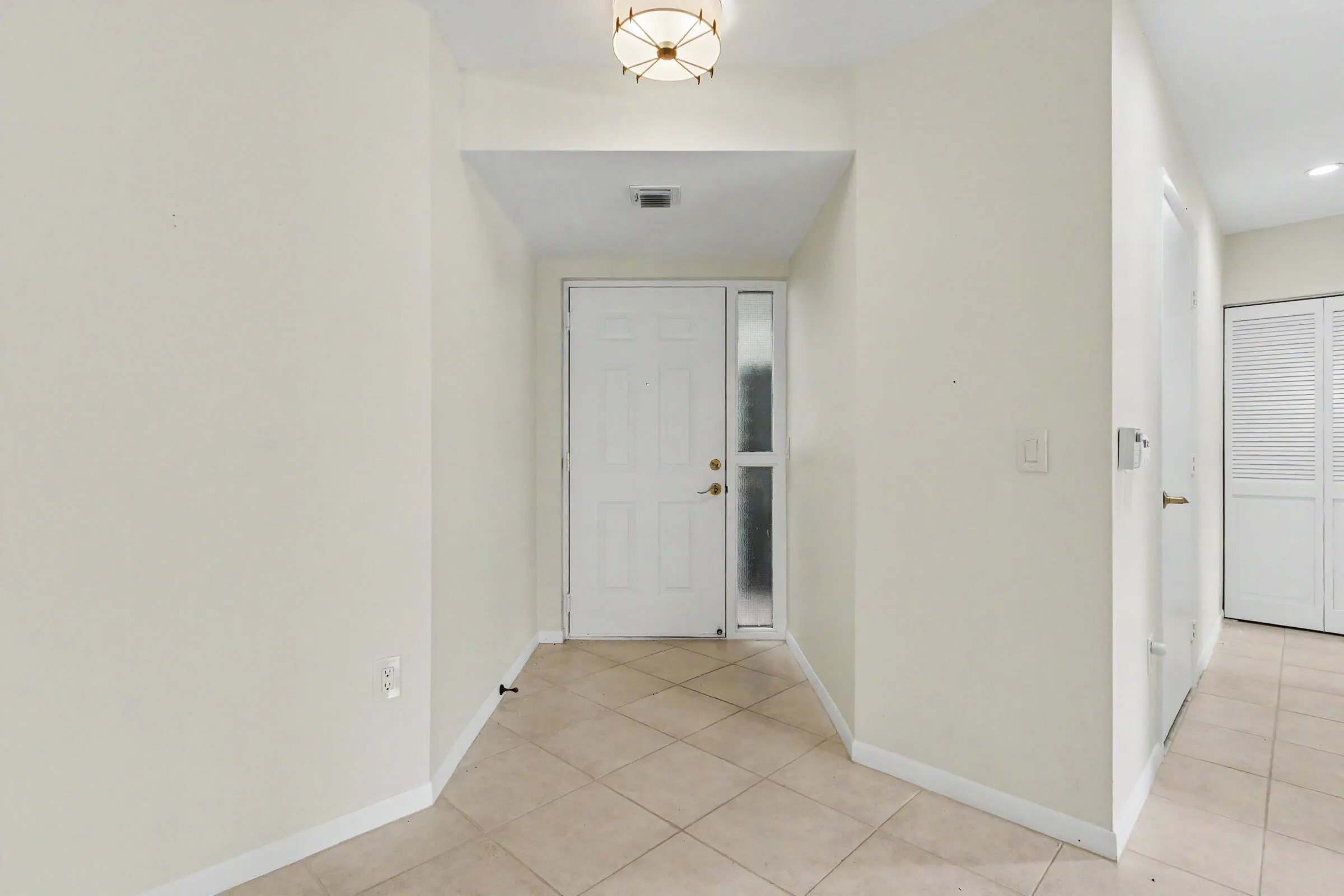 Looking at front door from inside.