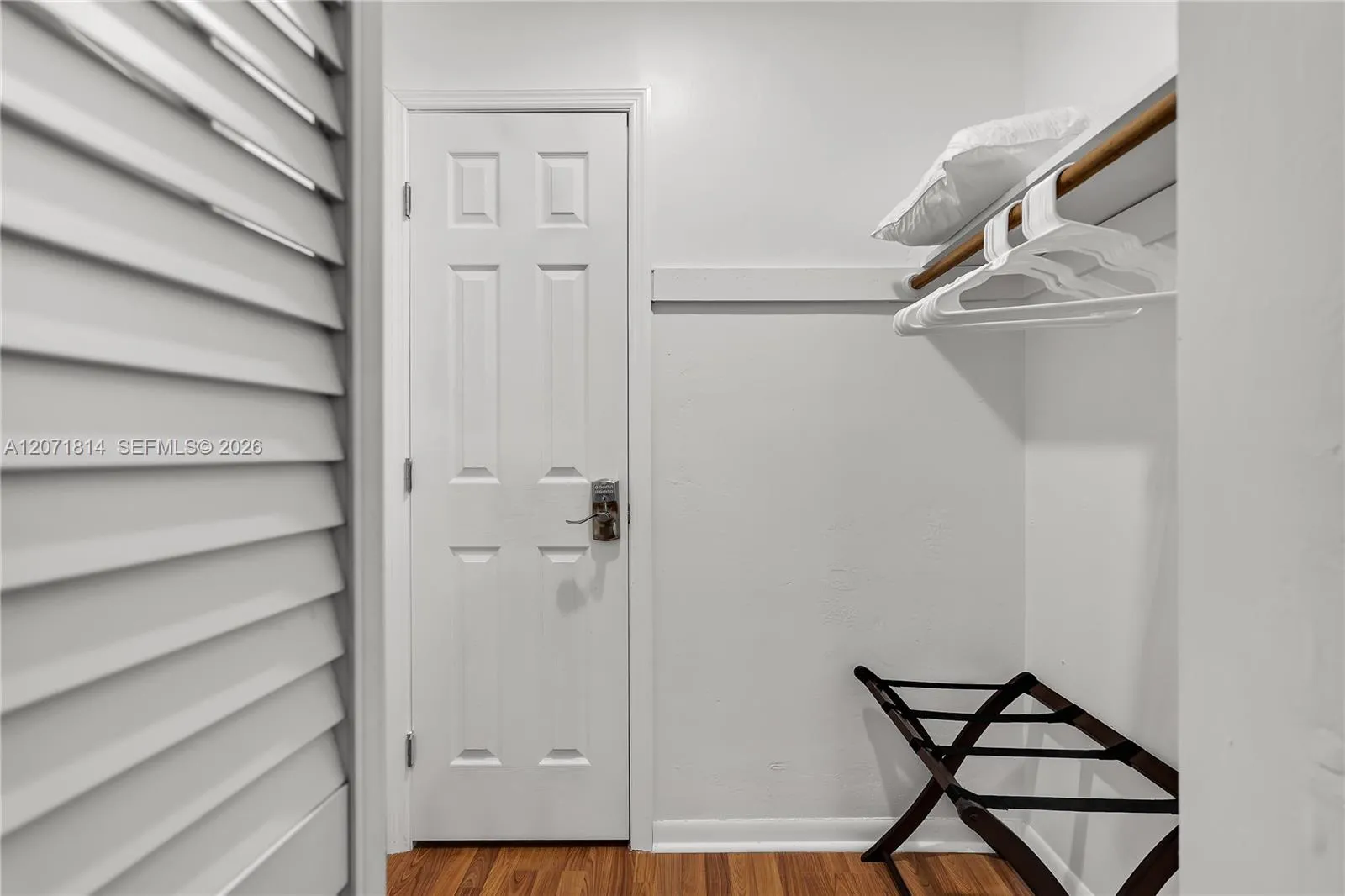 Custom-built walk-in closet with ample shelving and organization