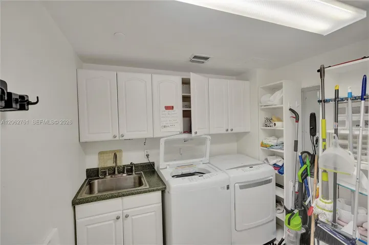 There is a full bathroom in the laundry.