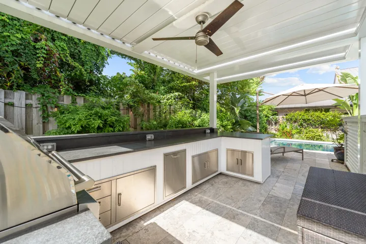 Spectacular outdoor kitchen with retractable roof.