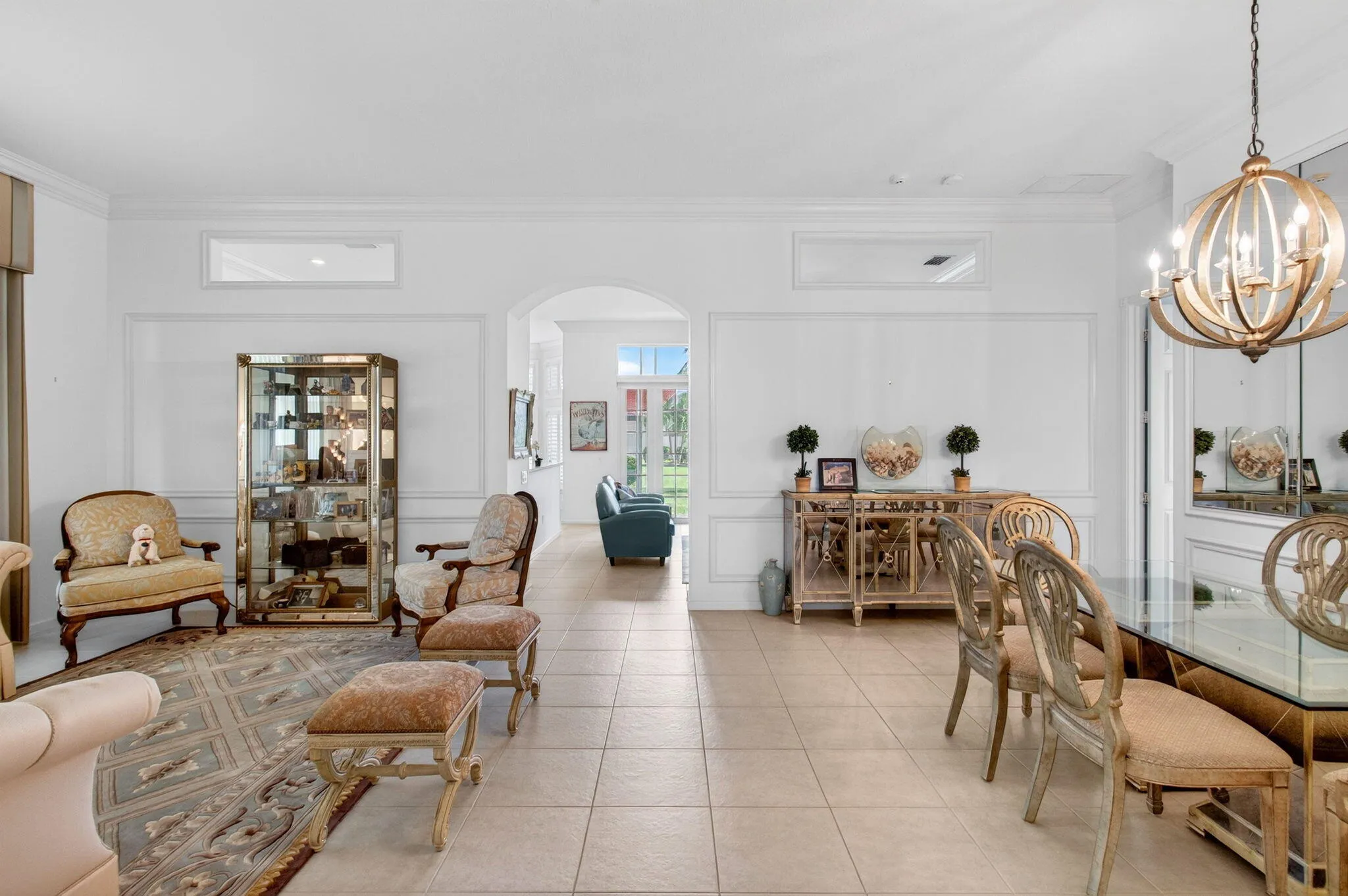 Tiled flooring throughout expansive living and dining areas