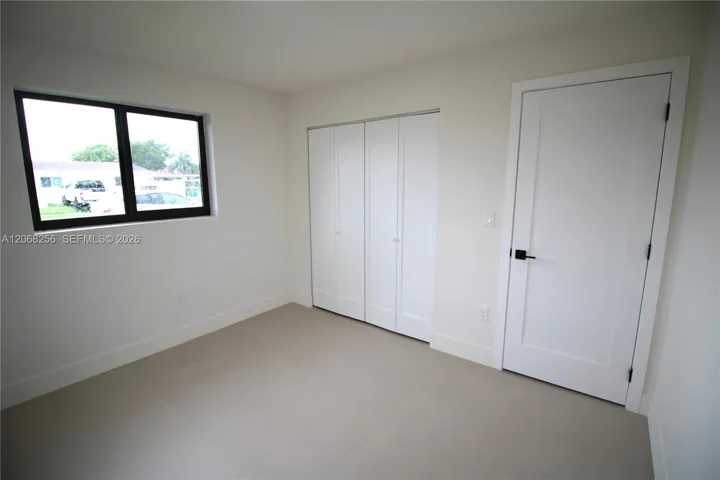 Bedroom 2 -10.9ft (north/south) x 9.6 ft