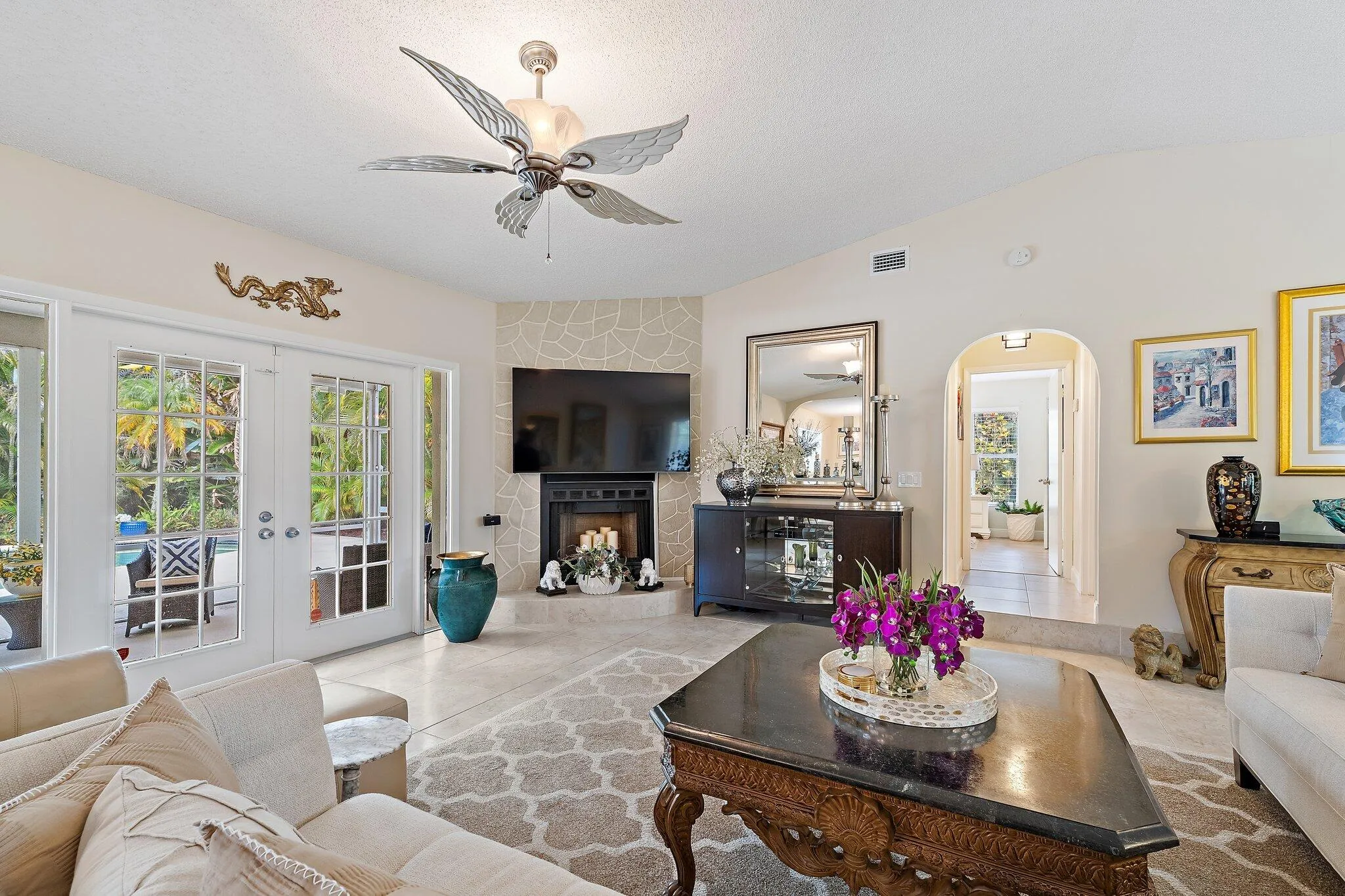 french doors lead to a covered patio