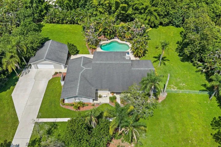 Enjoy 1.15 Acres of beautifully manicured grounds + Sunset Views!