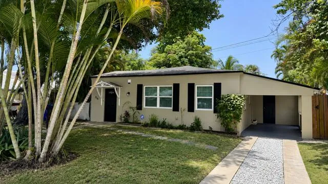 Curbside Appeal with carport and street parking