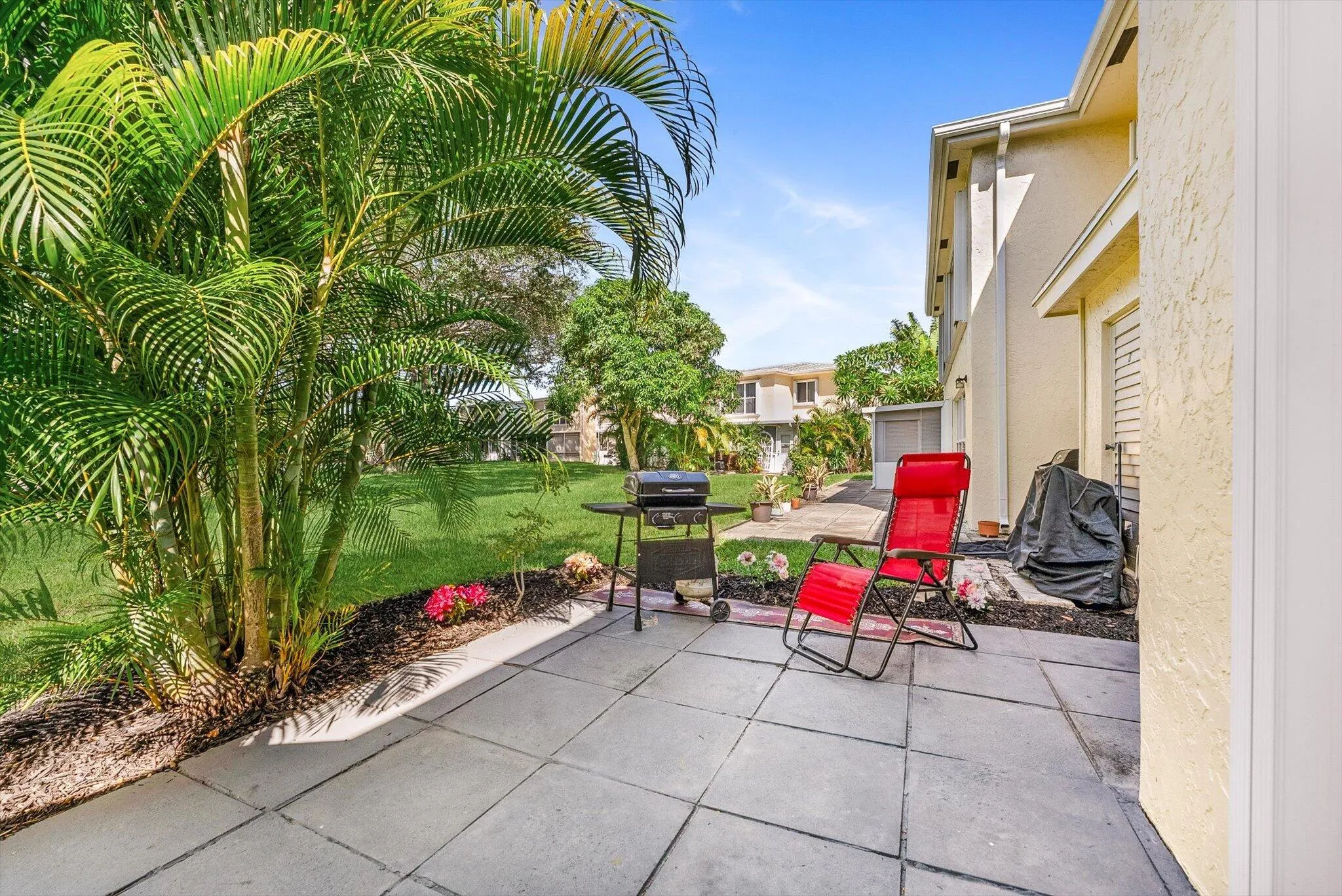 Extended back porch with space for Grills, Patio Furniture, and Outdoor living.