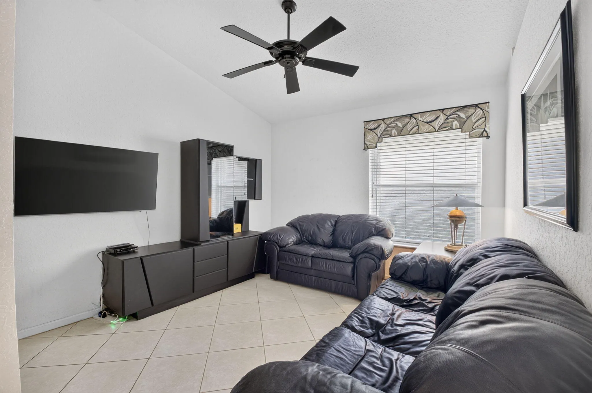 Guest bedroom being uses as a den
