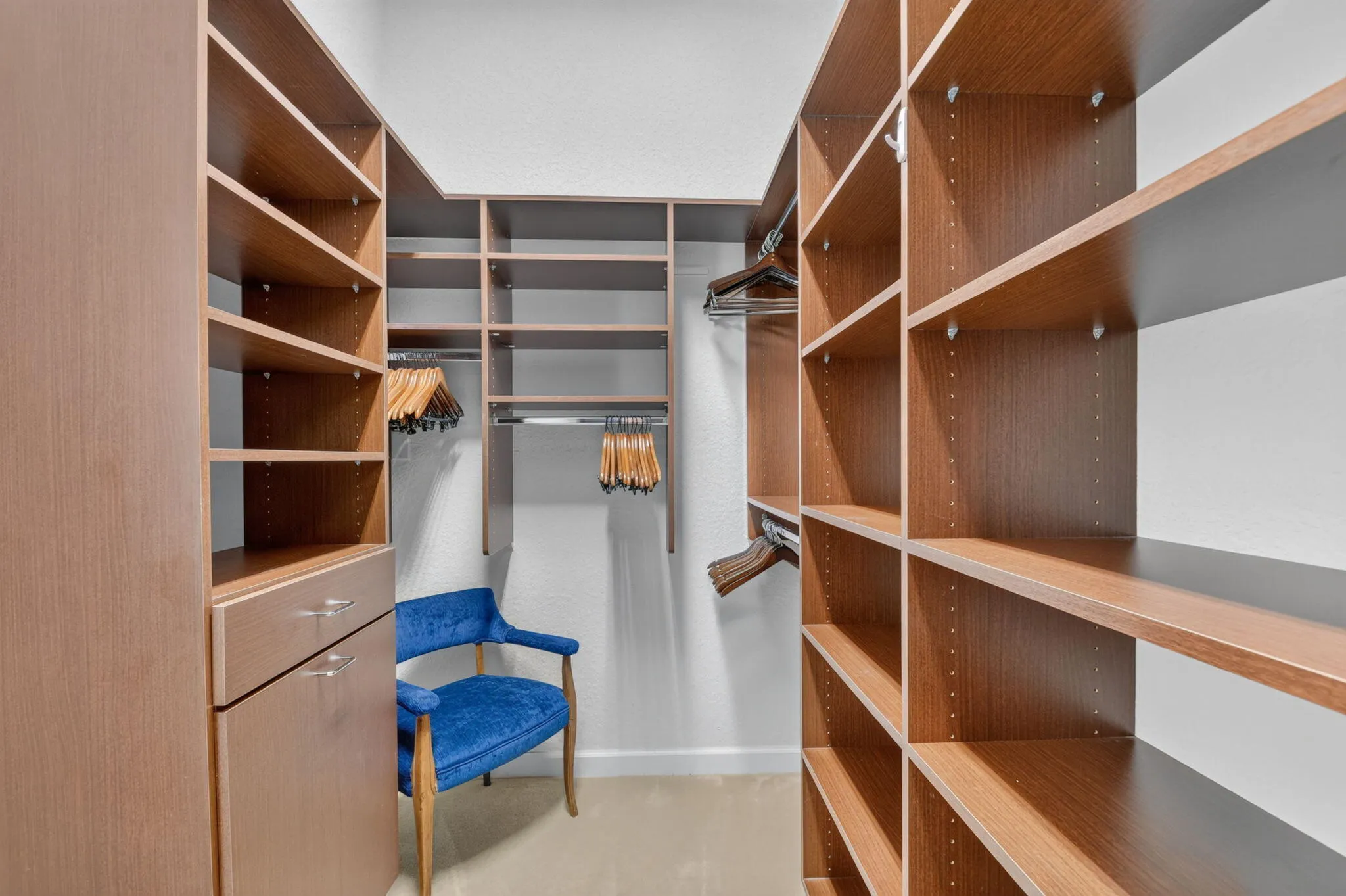 Gorgeous outfitted closet with loads of shelves and great space!