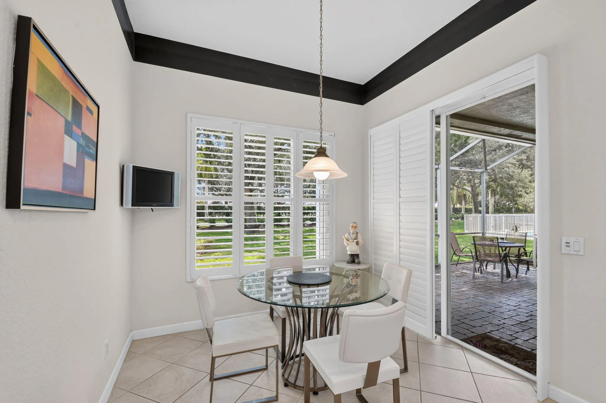 Eat-In-Kitchen with access to patio through slider.