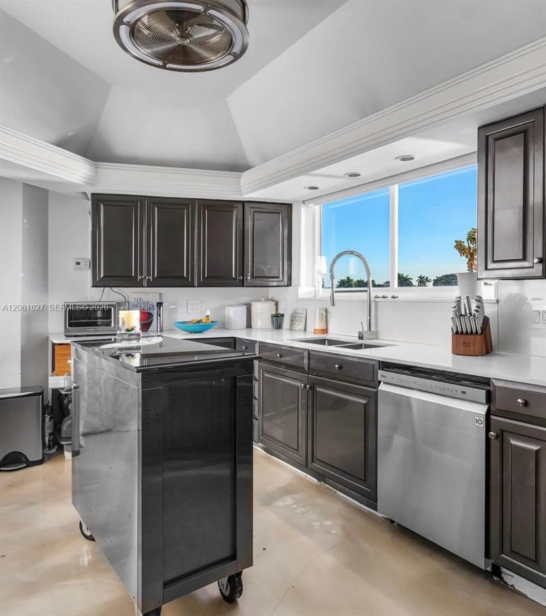 Laundry room and pantry in back.