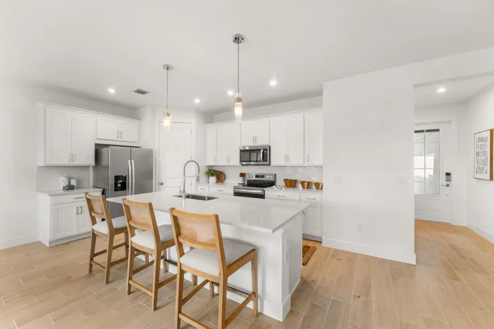Stock photos represent builder's floorplan