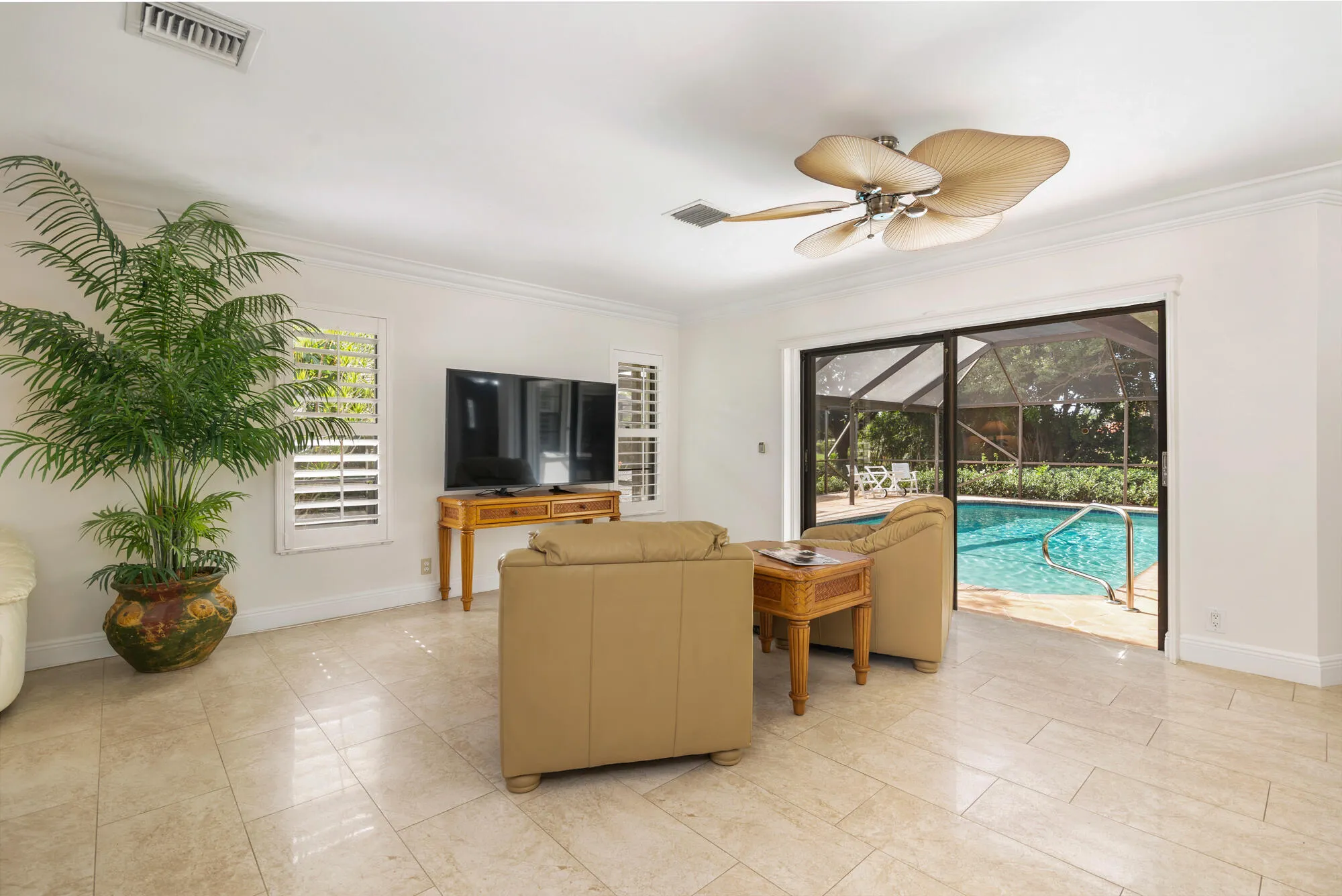 Family room overlooking pool