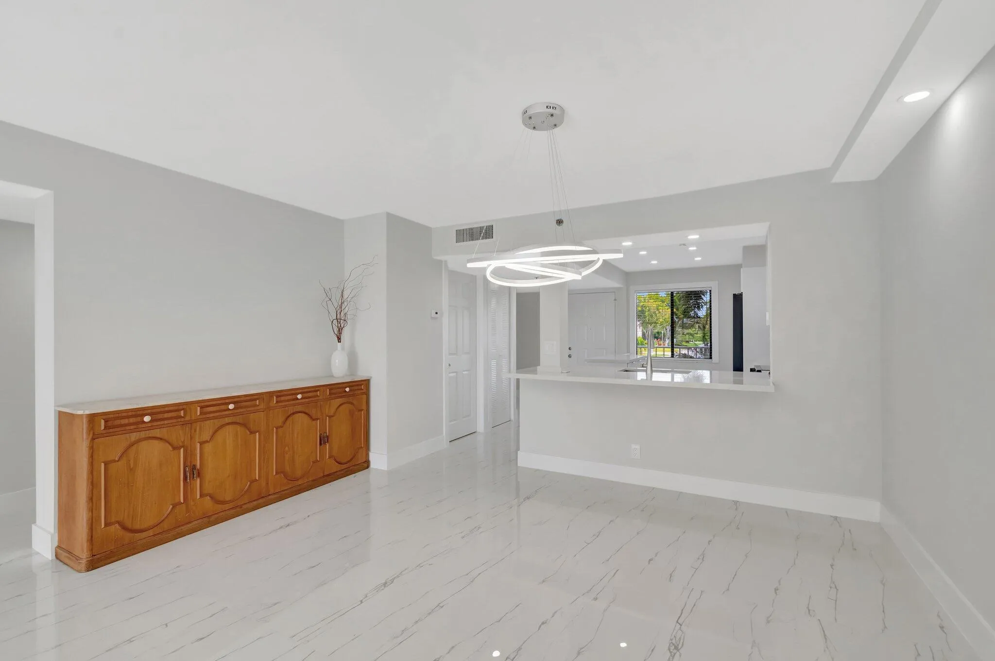 DINING AREA WITH SIDEBOARD