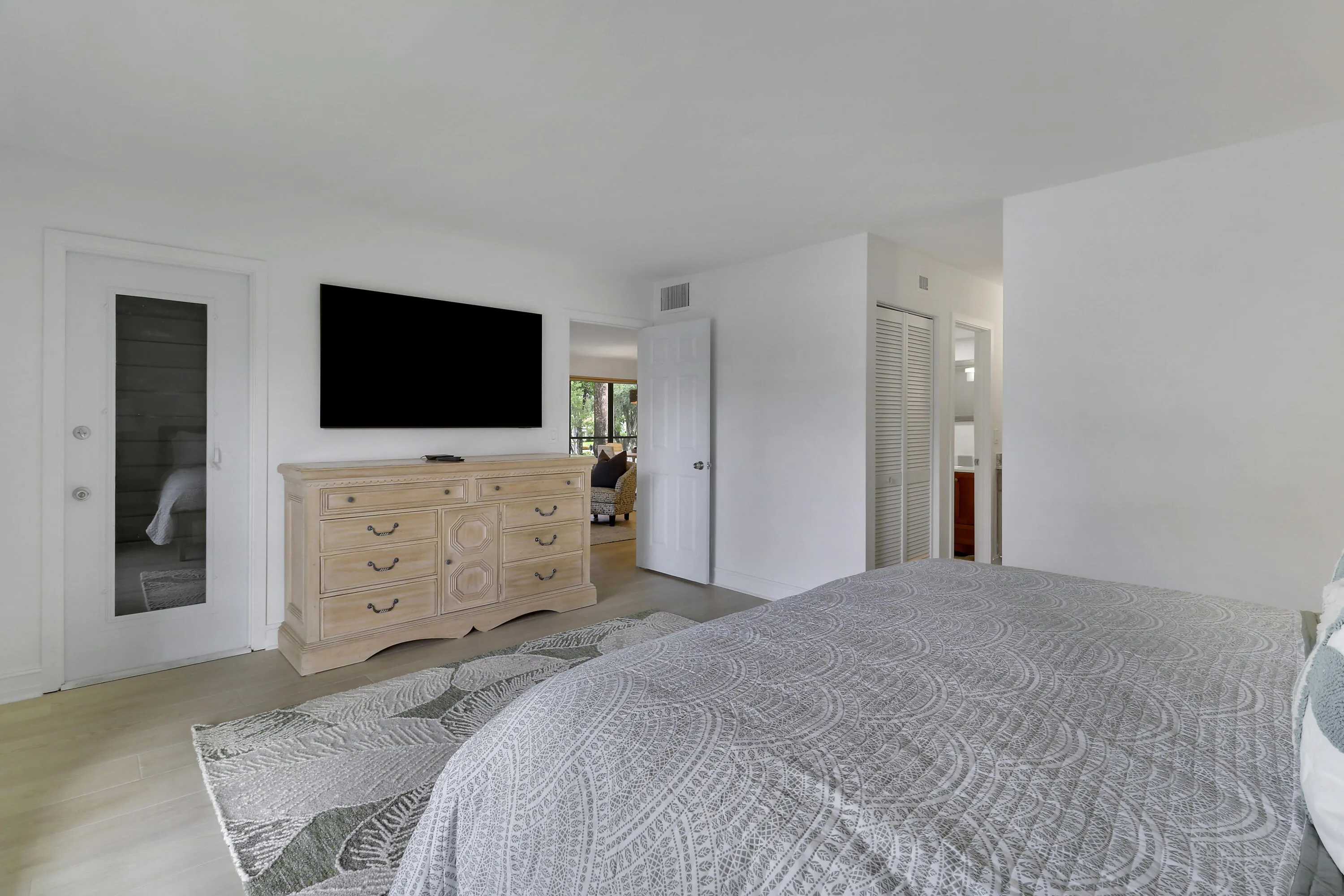 There is a flat screen tv in the master bedroom suite.