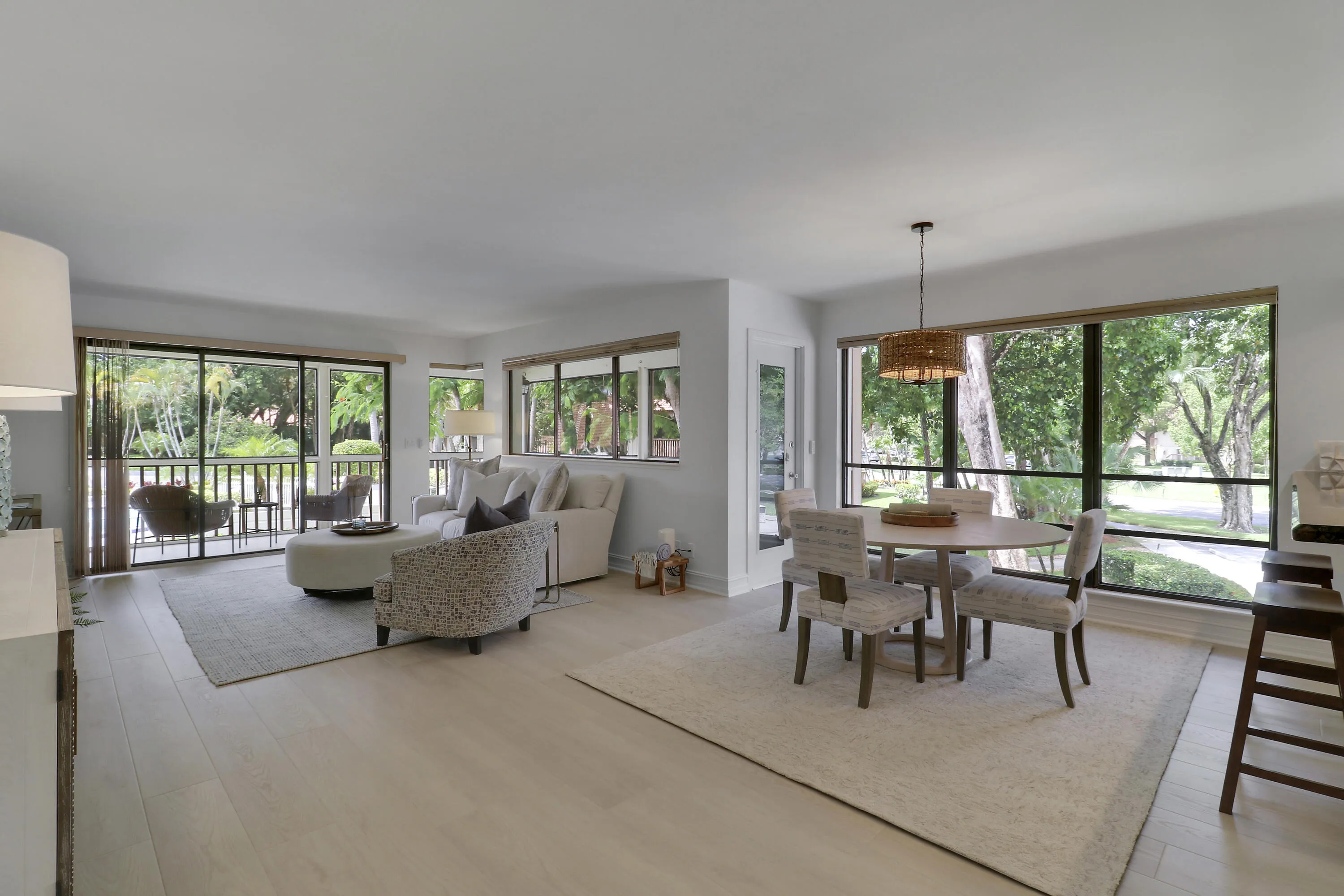 The large windows offer natural light through out the open floor plan.