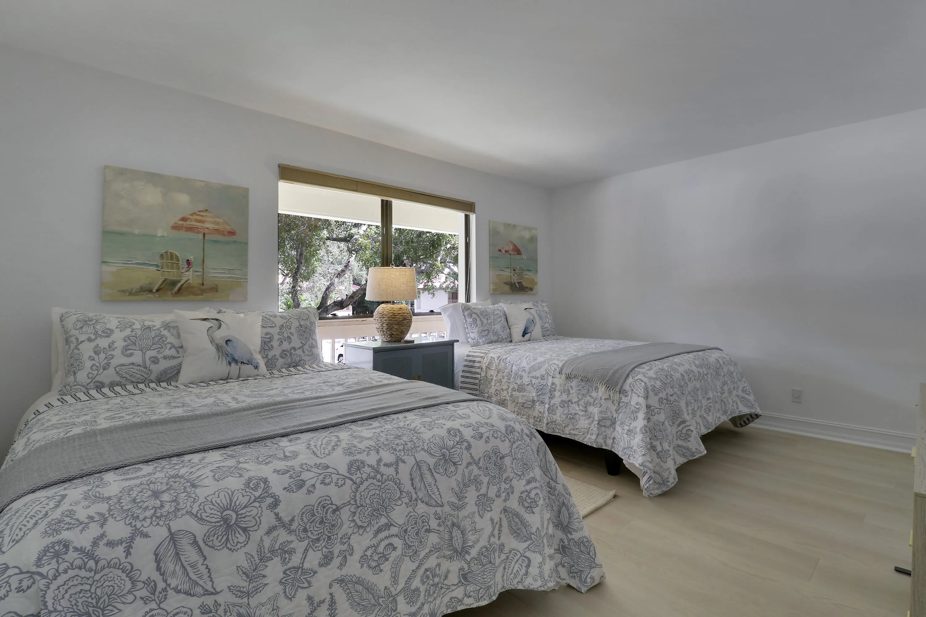 The guest room features two beds and sleeps 4.