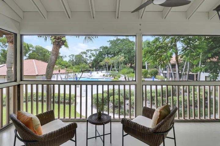 Enjoy views of the pool as you relax on the fully screened lanai.