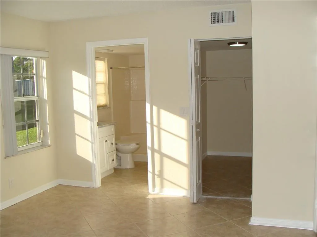 Master Bedroom showing Bathroom and Closet