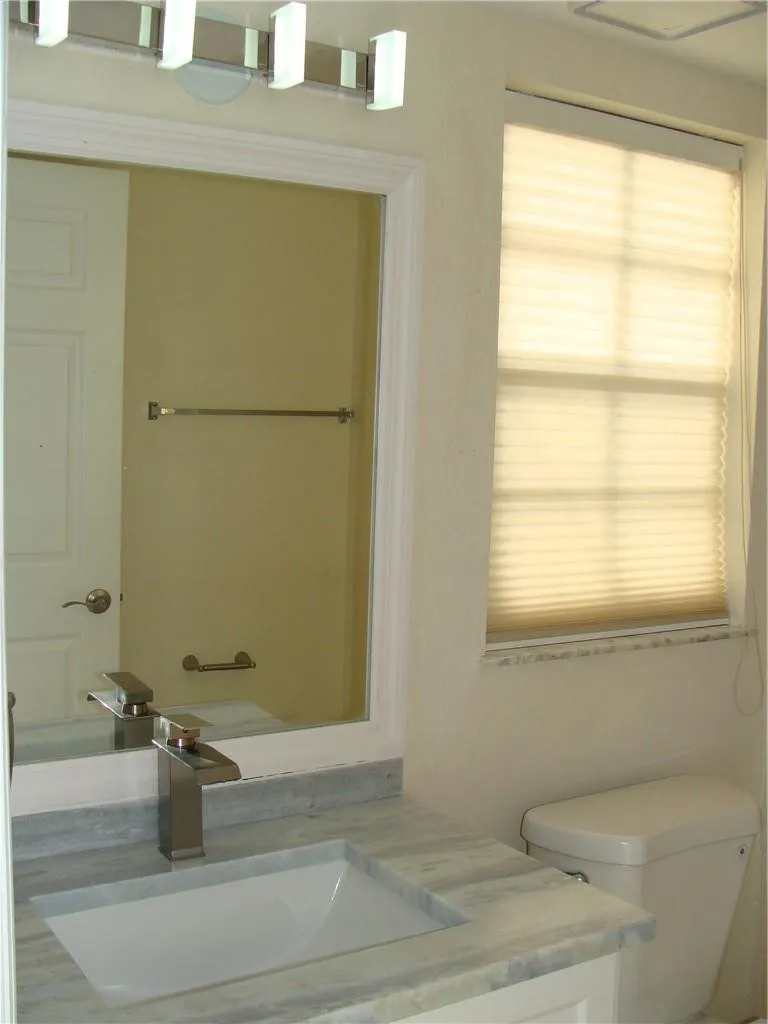 Master Bathroom with Premium Faucets and Granite