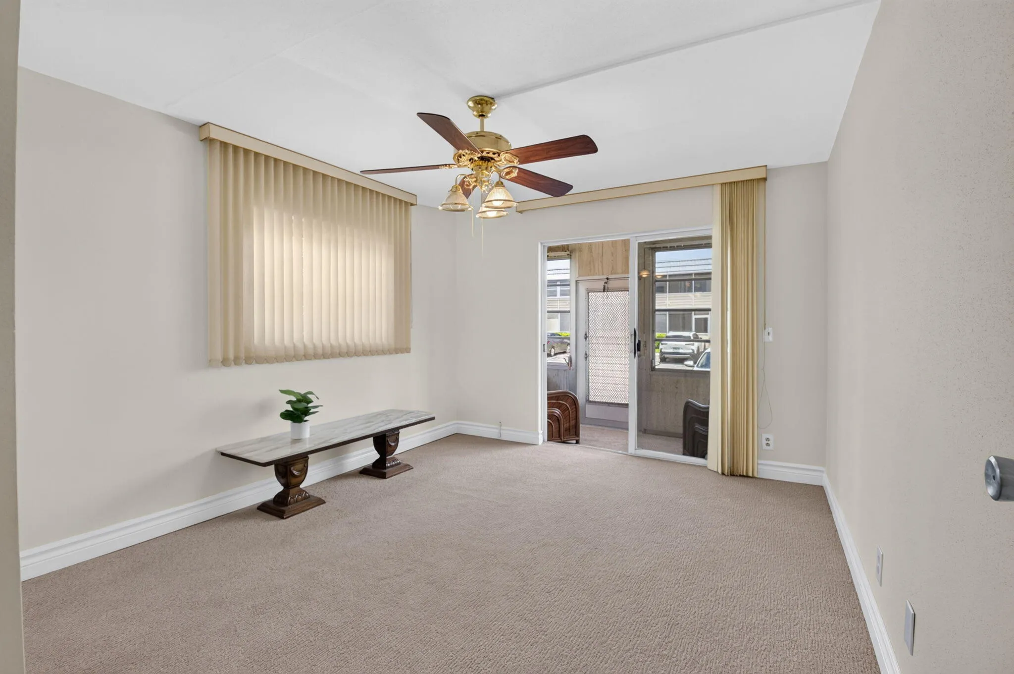 SECOND BEDROOM OPENS TO THE LANAI, NEW CARPET AND CEILING FAN