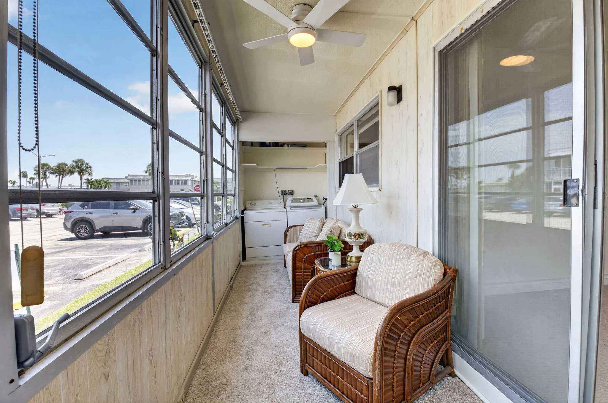 GLASS ENCLOSED LANAI ADDS AIRCONDITIONED LIVING SPACE