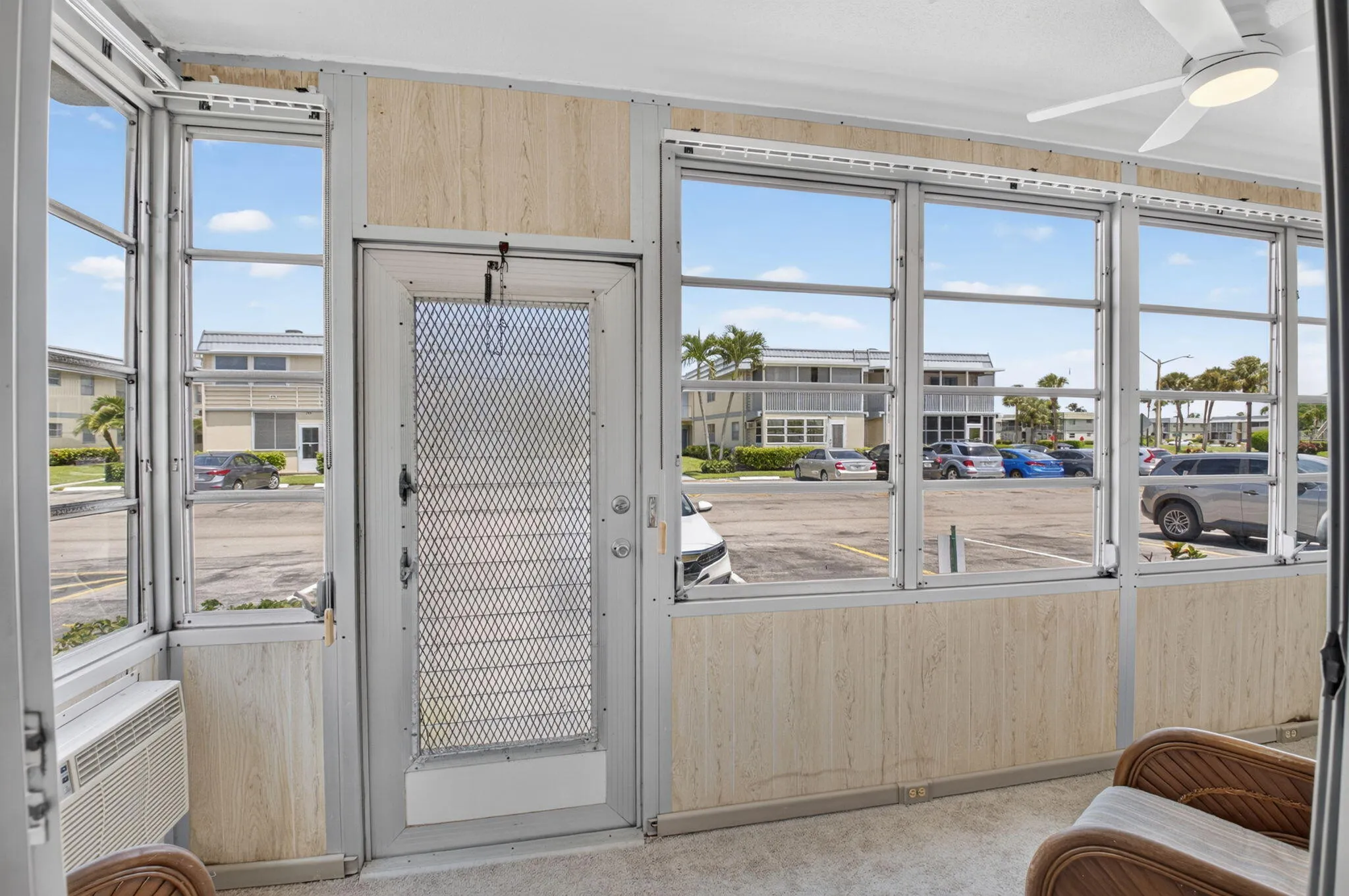 GLASS ENCLOSED LANAI ADDS AIRCONDITIONED LIVING SPACE!