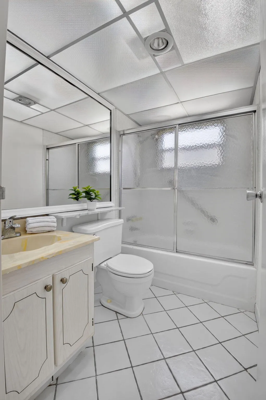 BATHROOM WITH NEW CEILING TILES