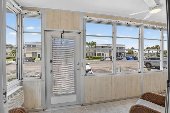 GLASS ENCLOSED LANAI ADDS AIRCONDITIONED LIVING SPACE!