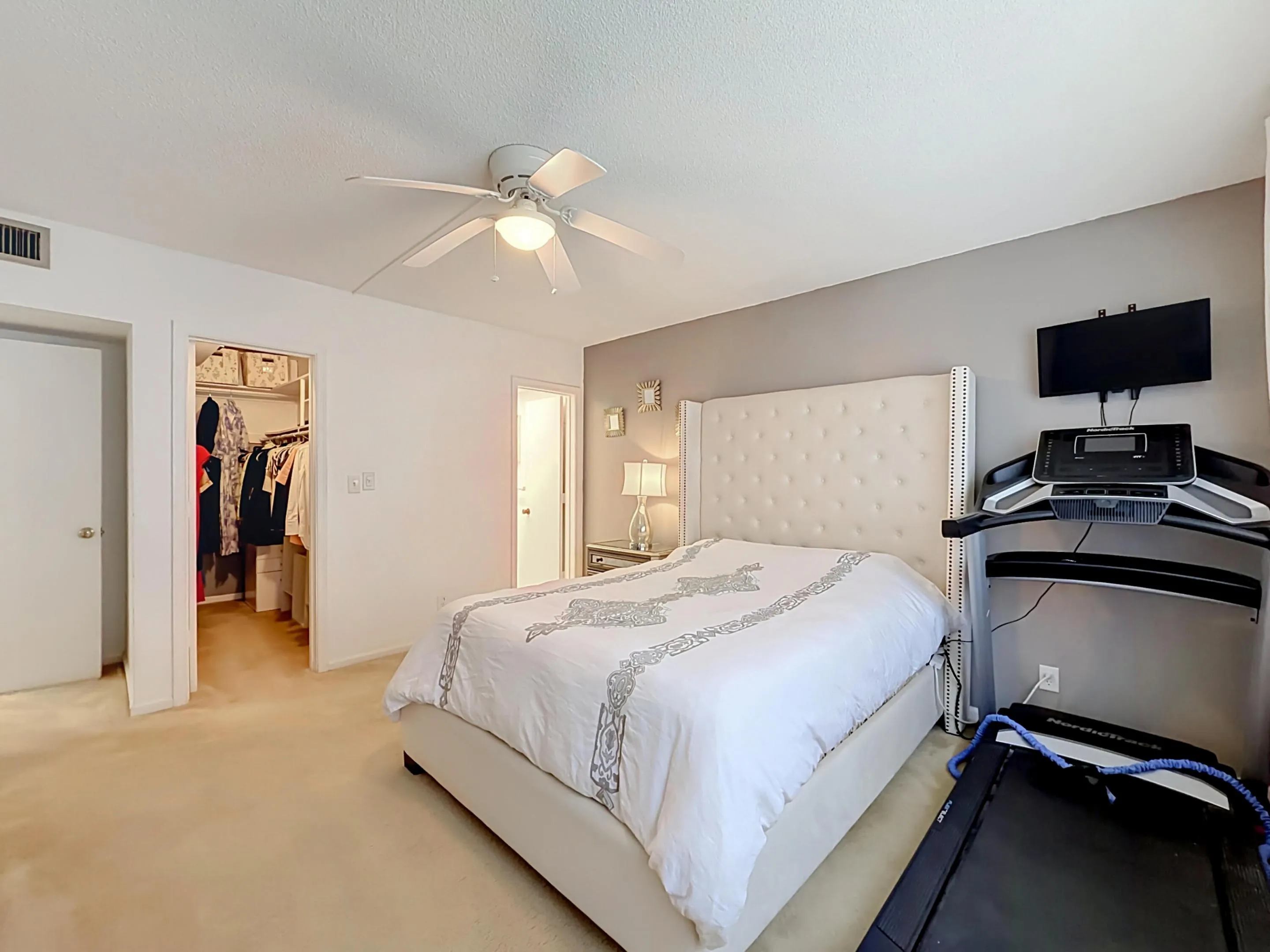 Recessed lighting, ceiling fan, walk-in closet, neutral wall tones, and carpeted flooring
