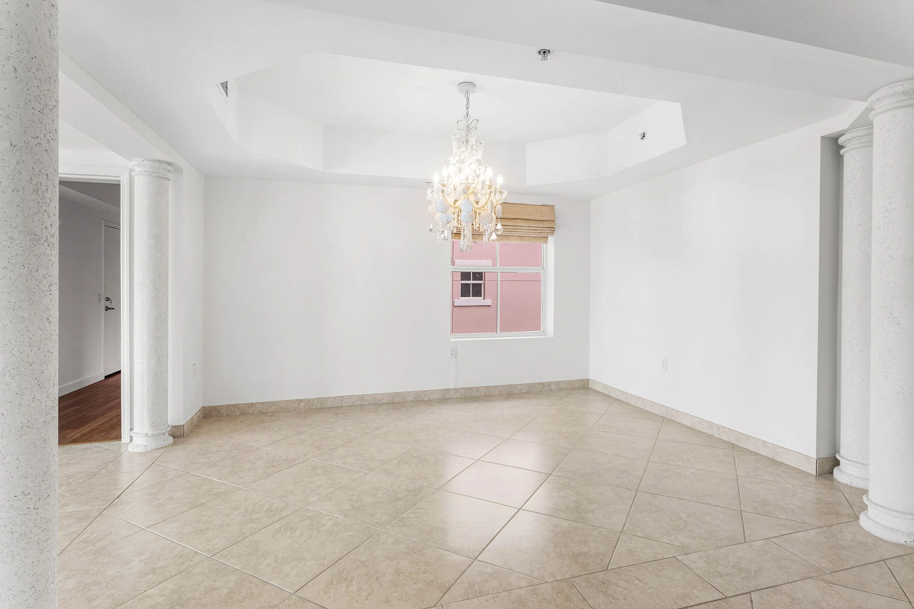 Tray ceiling with an elegant crystal chandelier