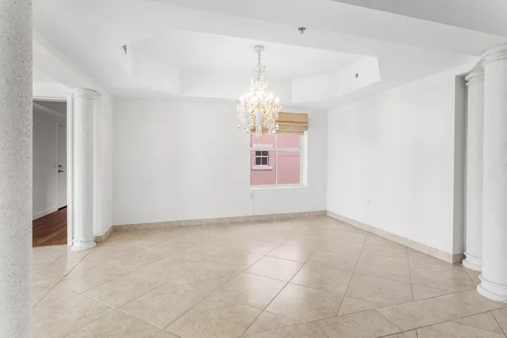 Tray ceiling with an elegant crystal chandelier