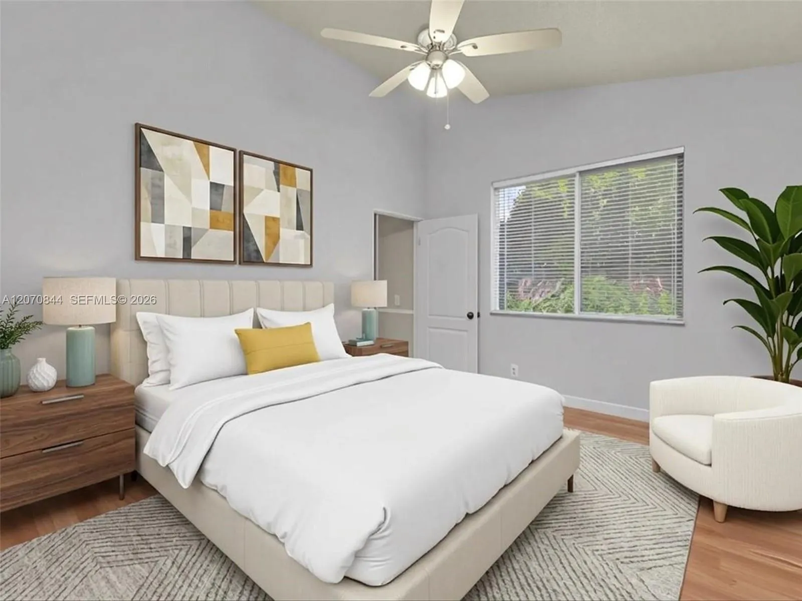 Spacious primary suite offering a private retreat with generous room to relax and unwind.