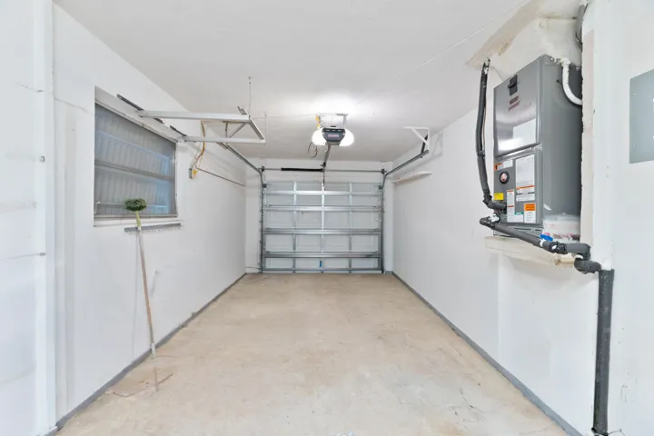 1 Car Garage with Newer Air Handler and Hurricane Impact Garage Door